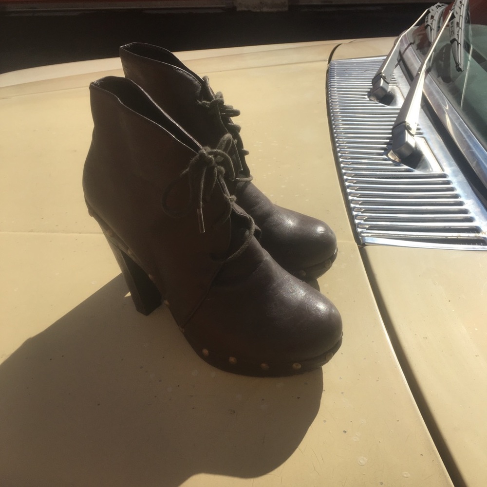 Brown high heel booties.
